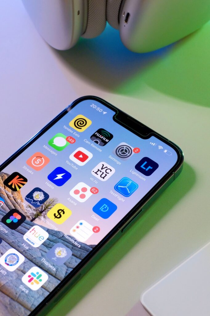 iPhone home screen showing native apps including TestFlight